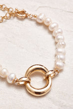 Load image into Gallery viewer, 18K gold-plated clasp with small crystal studs. Adorned with baroque pearls. Handmade jewelry in Brazil.