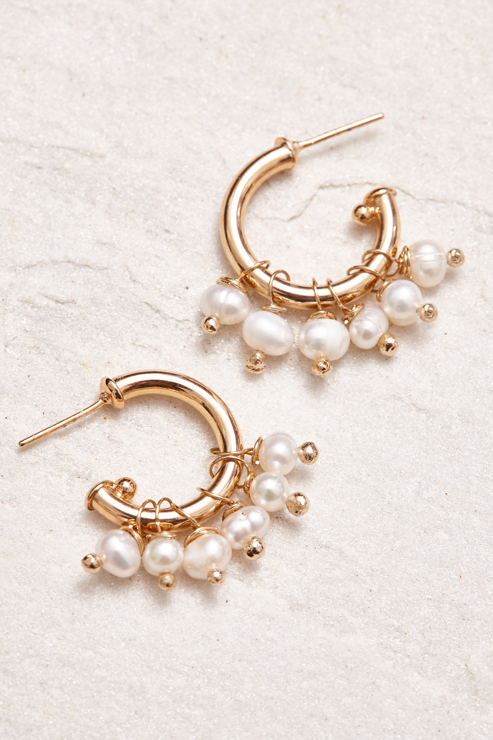 18K gold-plated hoops  freshwater pearls. Handmade in Brazil. 