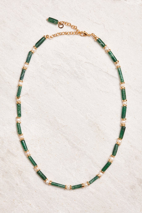 handmade in Brazil green gems with delicate baroque pearls in 18K gold-dipped brass. 